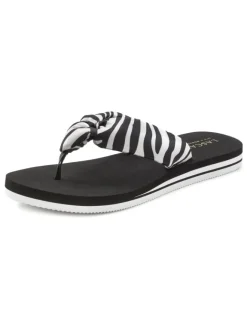 Badezehentrenner in schwarz/weiß><noscript><img width=